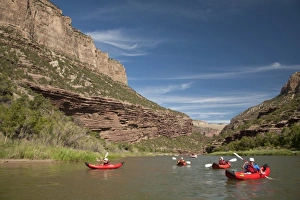 USA, Colorado, Dinosaur National Monument, Green River, children in kayaks. (MR) USA, Colorado, Dinosaur National Monument, Green River, children in kayaks. (MR)