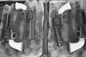 Images Dated 17th March 2003: USA, Florida, Plant City, Guns on display for a Cowboy Mounted Shooting compeition