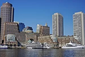 USA, Massachusetts, Boston. Boats and the skyline at Rowes Wharf