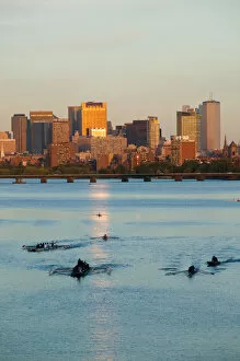 Images Dated 6th October 2004: USA-Massachusetts-Boston: Sunset View of Financial District and Rowers on the Charles