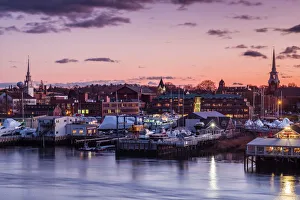 USA, Massachusetts, Newburyport, skyline from the Merrimack River at dusk USA, Massachusetts, Newburyport, skyline from the Merrimack River at dusk