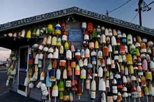 USA, Massachusetts, Provincetown. Buoys crowd together on a seafood shack USA, Massachusetts, Provincetown. Buoys crowd together on a seafood shack