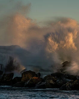 Related Images Gallery: USA, Minnesota, Lake Superior. Lake waves breaking on rocks at sunset