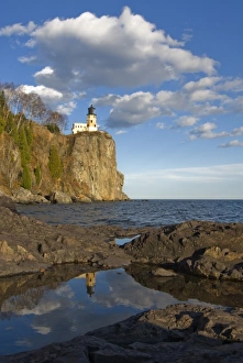 USA, Minnesota. Split Rock Lighthouse reflects in a pool on the shore of Lake Superior USA, Minnesota. Split Rock Lighthouse reflects in a pool on the shore of Lake Superior