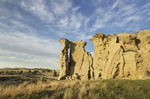 USA, Montana. Sandstone pillars or hoodoos rising from the prairie USA, Montana. Sandstone pillars or hoodoos rising from the prairie