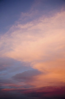 USA, New Mexico. Red colored clouds at sunset in northern New Mexico USA, New Mexico. Red colored clouds at sunset in northern New Mexico