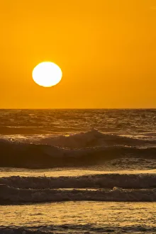 USA, Oregon, Bandon Beach. Sunset on ocean surf. Credit as USA, Oregon, Bandon Beach. Sunset on ocean surf. Credit as