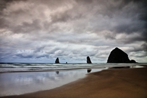 USA, Oregon, Cannon Beach. Haystack Rock at low tide USA, Oregon, Cannon Beach. Haystack Rock at low tide
