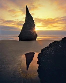 USA, Oregon. Rock formation at sunset on Bandon Beach. Credit as USA, Oregon. Rock formation at sunset on Bandon Beach. Credit as