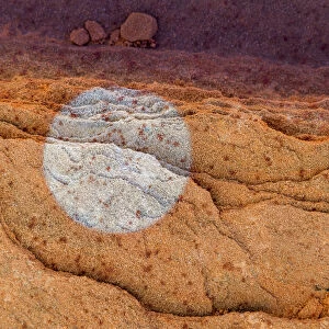 Bleached Gallery: USA, Utah. Circular bleaching pattern in sandstone