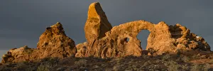 USA, Utah. Turret Arch with a dusting of snow, Arches National Park USA, Utah. Turret Arch with a dusting of snow, Arches National Park