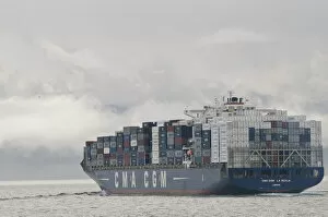 Images Dated 15th March 2012: USA, WA, Laden container ship moves through Strait of Juan de Fuca with fog and clouds