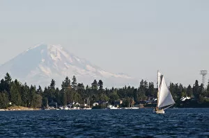 Images Dated 3rd September 2012: USA, WA, Poulsbo. Gaff rigged sailboat navigates Liberty Bay with Mt Rainier looming