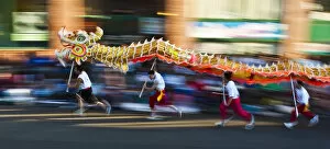 USA, Washington, Seattle. 100ft dragon in Chinatown Seafair Parade