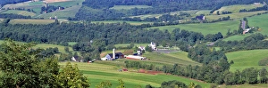 USA, West Virginia, Lewisburg area. A long, lovely view of the green farms in the USA, West Virginia, Lewisburg area. A long, lovely view of the green farms in the