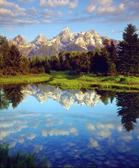 Images Dated 6th May 2014: USA; Wyoming, Grand Teton National Park. A Grand Tetons reflecting in the Snake River