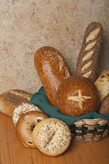 Similarity Gallery: Variety of homemade breads. Sourdough bread bowl, sourdough loaf, three seed loaf