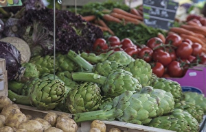 A vegetable stand in the outdoor market in the town of Auray in Brittany A vegetable stand in the outdoor market in the town of Auray in Brittany