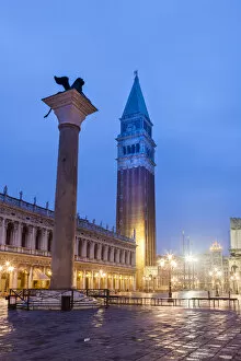 Images Dated 21st October 2013: Venezian Lion Statue and the Campanile early Morning. Venice. Italy