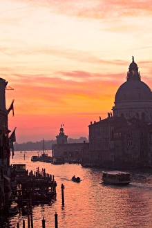 Venice, Italy. Santa Maria della Salute, a water taxi, motor boat, and the Ponte dell'Accademia Venice, Italy. Santa Maria della Salute, a water taxi, motor boat, and the Ponte dell'Accademia