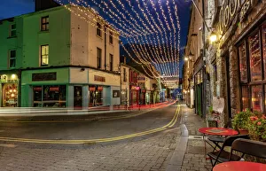 Street Gallery: Vibrant streets at dusk in downtown Galway, Ireland