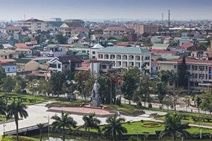 Vietnam, DMZ Area, Dong Ha, elevated city view, with Ho Chi Minh statue Vietnam, DMZ Area, Dong Ha, elevated city view, with Ho Chi Minh statue