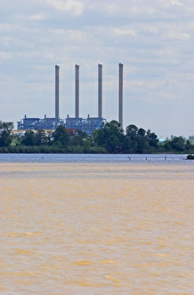 A view from Bourg across the Dordogne river of the oil refinery industrial plant A view from Bourg across the Dordogne river of the oil refinery industrial plant