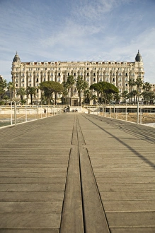View of Carlton Hotel from beach walk area of Cannes, France View of Carlton Hotel from beach walk area of Cannes, France