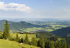 View over the foothills of the Chiemgau Alps and town Aschau in Upper Bavaria View over the foothills of the Chiemgau Alps and town Aschau in Upper Bavaria