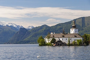 View of schloss Ort (castle) at Traunsee lake, Upper Austria, Austria View of schloss Ort (castle) at Traunsee lake, Upper Austria, Austria