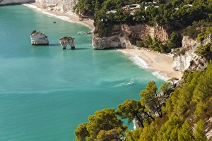 View of Zagare Bay and two sea stacks, Gargano Promontory, Apulia, Italy View of Zagare Bay and two sea stacks, Gargano Promontory, Apulia, Italy