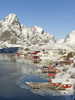 Village Reine on the island Moskenesoya. The Lofoten Islands in northern Norway during winter Village Reine on the island Moskenesoya. The Lofoten Islands in northern Norway during winter