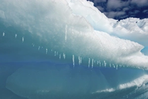 water dripping from icicles hanging along an iceberg, western Antarctic peninsula water dripping from icicles hanging along an iceberg, western Antarctic peninsula