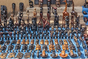 West Africa, The Gambia, Banjul. Wooden masks, animals, and other crafts for sale West Africa, The Gambia, Banjul. Wooden masks, animals, and other crafts for sale