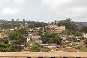 West Africa, Sierra Leone, Freetown. Suburban development houses on a hillside West Africa, Sierra Leone, Freetown. Suburban development houses on a hillside