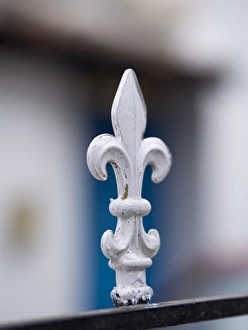A white metal spike sticks up from a gate in Bangalore, Karnataka, India A white metal spike sticks up from a gate in Bangalore, Karnataka, India