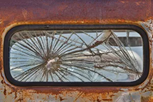 Back window with bullet holes old truck detail in Sprague, Washington State Back window with bullet holes old truck detail in Sprague, Washington State