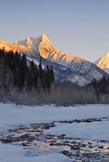 Wolftail Mountain and Mt Doody loom over a channel of the Middle Fork of the Flathead Wolftail Mountain and Mt Doody loom over a channel of the Middle Fork of the Flathead