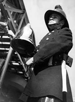 Firefighter adjusting turntable ladder mechanism Firefighter adjusting turntable ladder mechanism