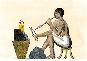 <b class=qtipBold><figcaption>Silversmith in ancient Egypt</figcaption></b><br>Ancient Egyptian worker in silver. Hand-colored woodcut of a 19th-century illustration<br><em>© North Wind Picture Archives</em> Silversmith in ancient Egypt