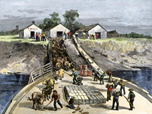 Steamboat taking on cargo, Mississippi river, 1800s Steamboat taking on cargo, Mississippi river, 1800s