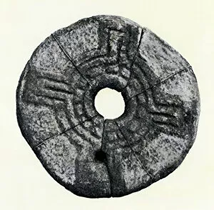 Pagan Collection: Sun-wheel on a Celtic quern, Ireland