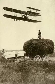Wright airplane over a French farm