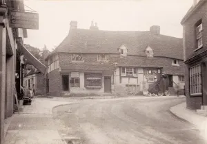 Prints of The cottages are now home to Midhursts public library John Fletcher Collection West Sussex Record Office, Ref No PH 26114/52 West Sussex Prints: Print of Midhurst cottages on Knockhundred Row, 1902