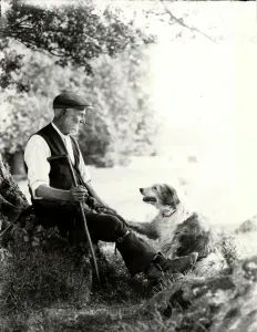 Prints of Photograph by George Garland Garland Collection West Sussex Record Office Ref No: Garland N7561 West Sussex Prints: Print of a shepherd with crook and sheep dog at Goodwood, July 1933