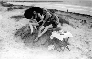 Prints of Three young women taking tea George Garland Collection West Sussex Record Office Ref No: Garland N69 West Sussex Prints: Print of Three Young Women on Littlehampton Sand Dunes, 1920s