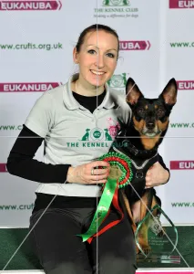 <b class=qtipBold><figcaption>Crufts 2015</figcaption></b><br>Picture shows Helen anderson winner of medium agility with her Kelpie, Demon today (Friday 06.03.15), the second day of Crufts 2015, at the NEC Birmingham.<br><em>© OnEdition / The Kennel Club</em> Crufts 2015