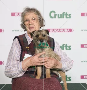 <b class=qtipBold><figcaption>Crufts 2017</figcaption></b><br>Anne Roslin-Williams from Worcestershire with Ling a Border Terrier, which was the Best of Breed winner today (Thursday 09.03.17), the first day of Crufts 2017, at the NEC Birmingham. Crufts 2017