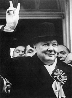 (1874-1965). English statesman and writer. Photographed flashing his 'V for Victory' (1874-1965). English statesman and writer. Photographed flashing his 'V for Victory'