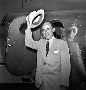 Gesture Gallery: ADLAI STEVENSON (1900-1965). American lawyer and political leader. Arriving in Chicago, Illinois
